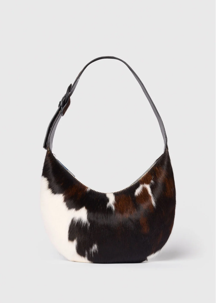 Flatshot of the cow print sia bag