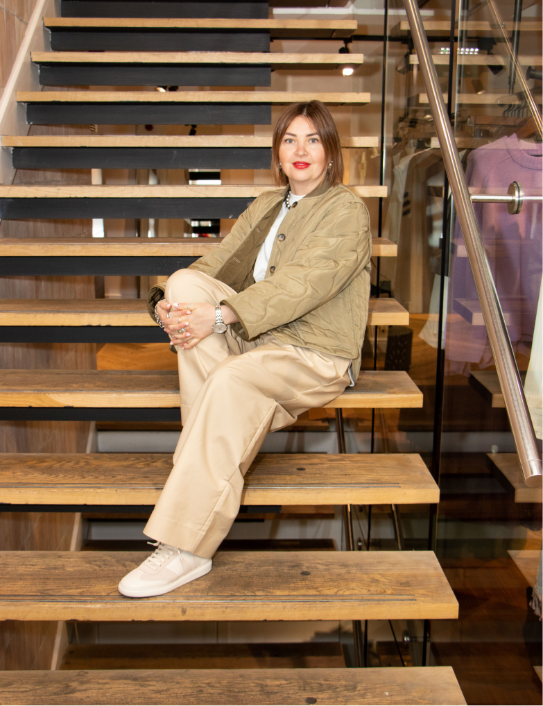 Woman sitting on the stairs