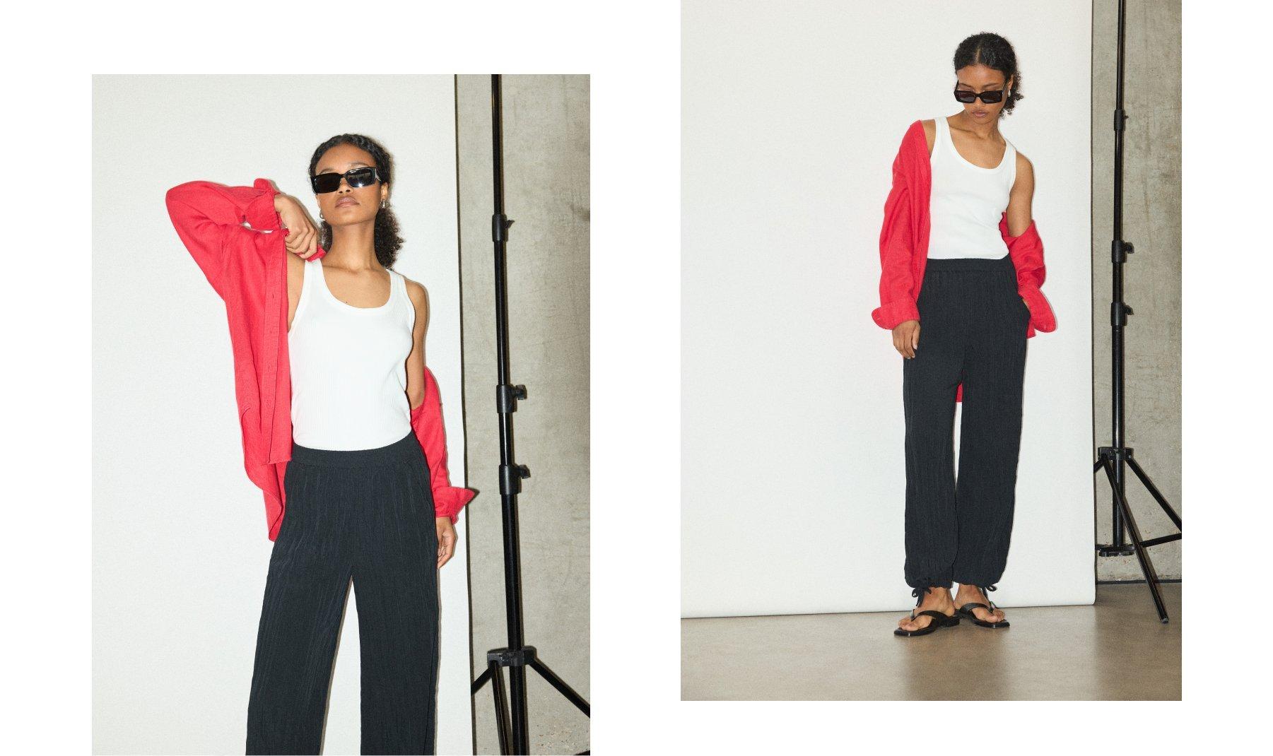 Model standing in the red linen shirt
