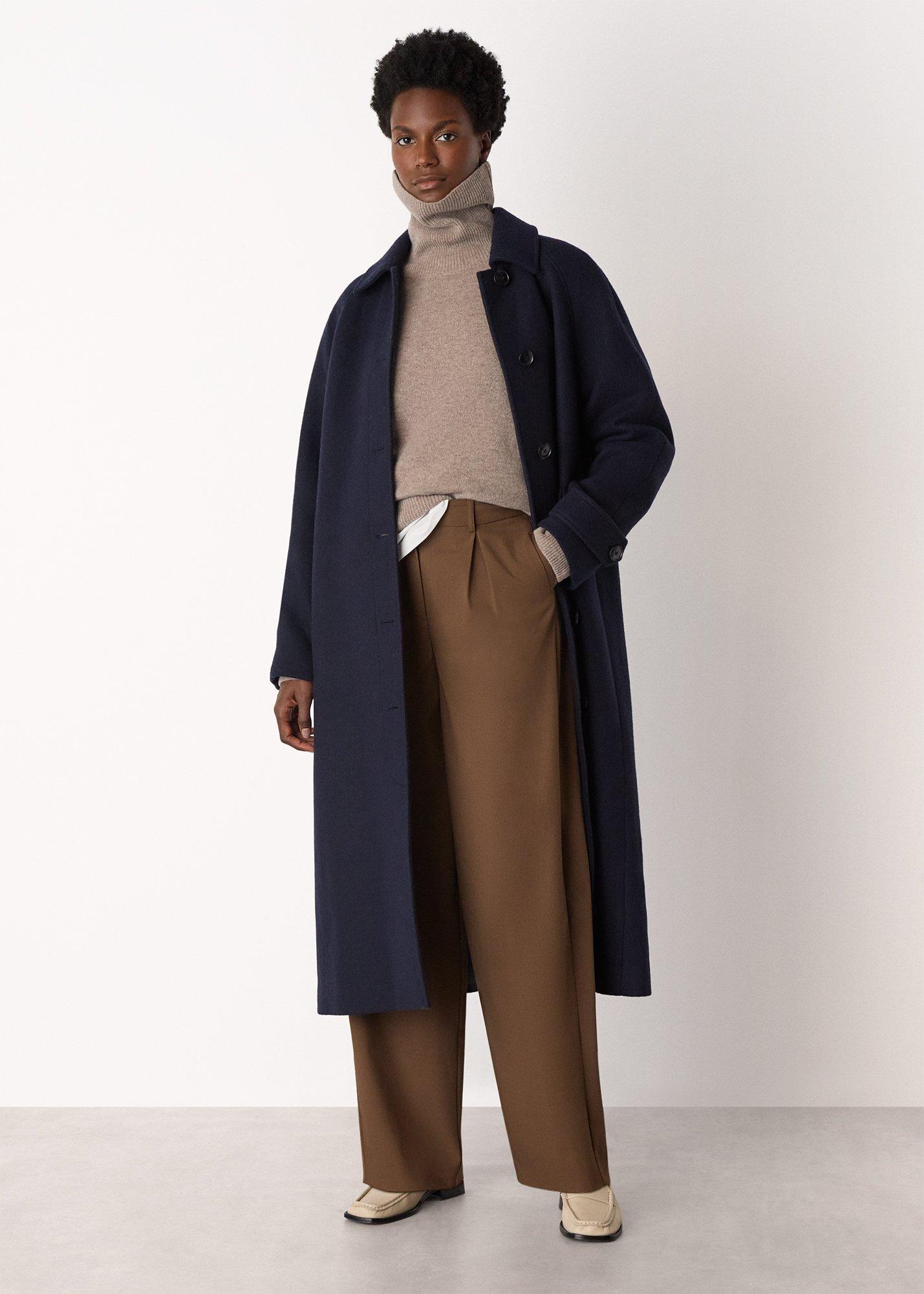 Wool Roll Curved Hem Knit